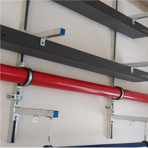 On-site installation photo of UTT82 clevis pipe clamp, galvanized pipe clip fixed red fire sprinkler pipe on galvanized strut channel seismic bracing system