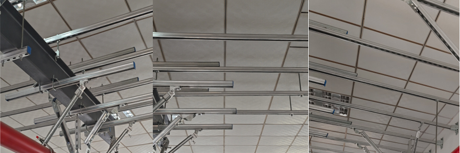 Galvanized strut channel system installed in overhead HVAC and piping support